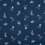 Popeline de coton imprimé Stitch fond bleu nuit