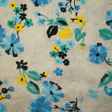 100% Lin brodé fleurs turquoise, vert et jaune fond ficelle