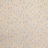 Piqué de coton imprimé jeune lapin fond beige