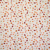 Coton imprimé au gré du vent orange fond blanc