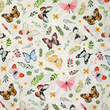 Coton imprimé papillons multicolore fond blanc