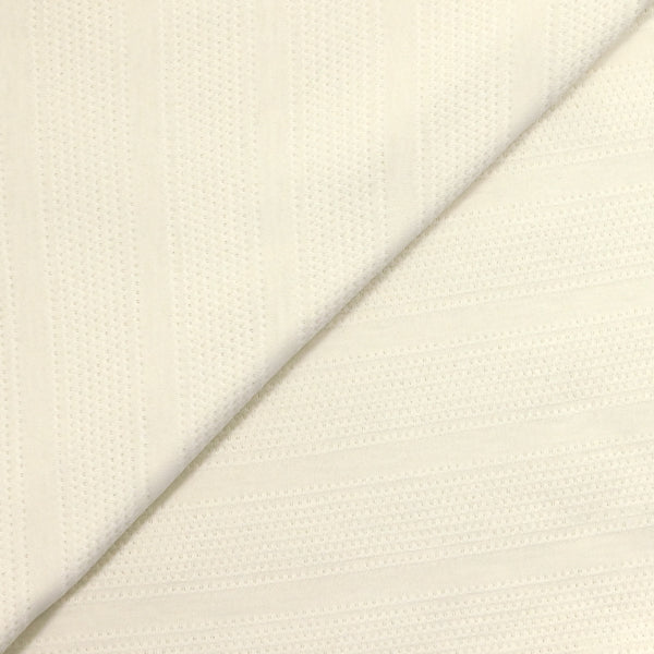 Jersey de coton grandes rayures ajourées ton sur ton blanc cassé