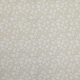 Piqué de coton imprimé fleurs printanière fond beige