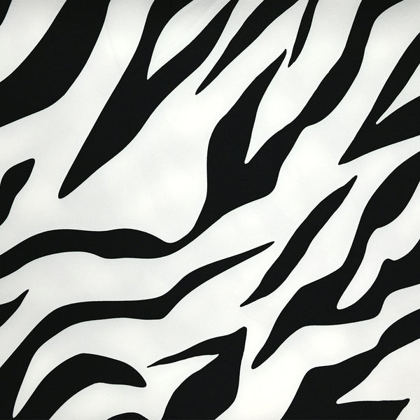 Crêpe lourd de polyester élasthanne imprimé zébrage noir et blanc