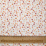 Algodón impreso de acuerdo con el fondo blanco del viento naranja