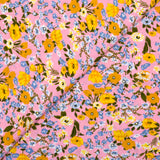 Viscose imprimée fleurs moutarde fond rose