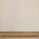 Piqué de coton imprimé carré beige