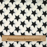 Estrellas negras poliéster satén de fondo blanco roto