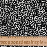 Jersey polyester écailles fond noir