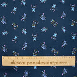 Popeline de coton imprimé Stitch fond bleu nuit