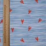 Recycled swimsuit fabric upf50 striped and lobster blue and white background