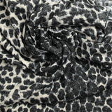Maille polyester imprimée guépard gris fond écru