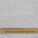 Piqué de coton imprimé étoiles fond gris