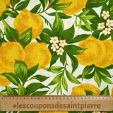 Polycotton printed lemons and green leaves white background