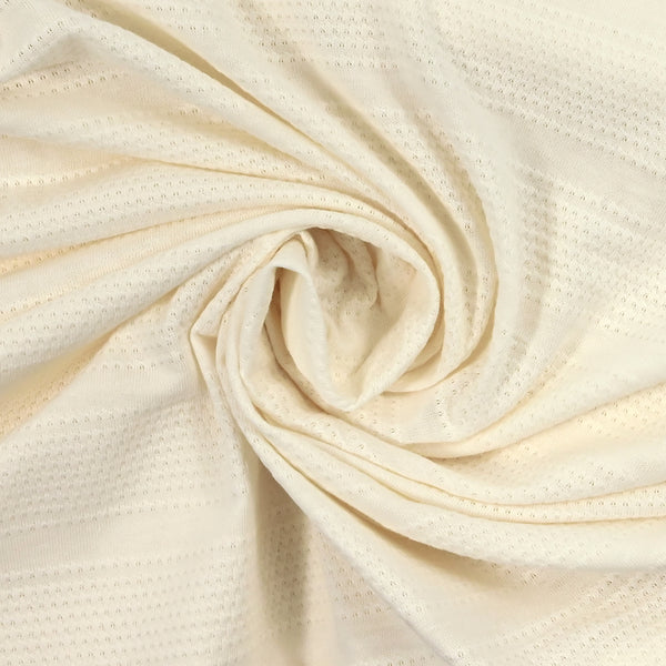 Jersey de coton grandes rayures ajourées ton sur ton blanc cassé