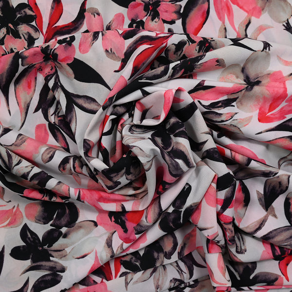 Crêpe de polyester élasthanne imprimé fleurs rose fond blanc