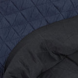 Matelassé jersey triangle navy blue background