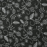 Twill de polyester brodé Solène fond noir