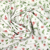 Celestial rosa y verdes estampado de algodón blanco Fondo blanco