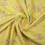 Crêpe polyester imprimé fleur rose fond jaune soufre