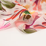 Mousseline printed crinkle plumetis multicolored flowers white background