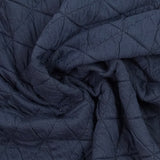 Matelassé jersey triangle navy blue background