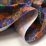 Coton imprimé mandala indigo, vert et orange