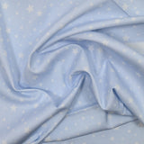 Cotton print stars light blue background