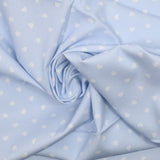 Cotton printed cotton stuck in light blue background