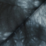 Sergé de coton élasthanne tie & dye gris bleu