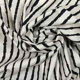 Coton imprimé fin taches rayées noir fond écru