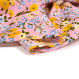 Viscose imprimée fleurs moutarde fond rose