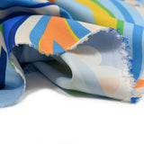 Polyester satin elastane printed drop of blue and orange rain
