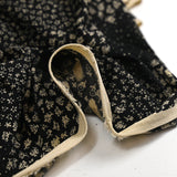 Jersey imprimé graphique en polyester noir et écru