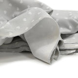 Piqué de coton imprimé cœur fond gris