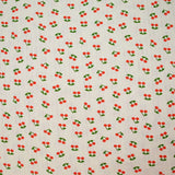 Jersey pointelle coton imprimé cerise fond blanc cassé