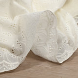 Broderie anglaise festonnée Adela fond blanc cassé