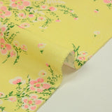 Crêpe polyester imprimé fleur rose fond jaune soufre