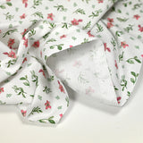 Celestial rosa y verdes estampado de algodón blanco Fondo blanco