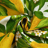 Polycotton printed lemons and green leaves white background