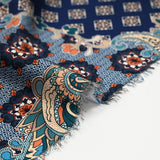 Satin polyester imprimé patchwork et cachemire canard fond bleu marine