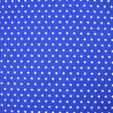 Coton imprimé étoiles fond bleu roi