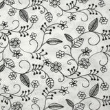 Twill de polyester brodé Solène fond blanc