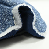 Chambray matelassé imprimé tie and dye petites fleurs