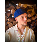 Man sewing pattern: head caps