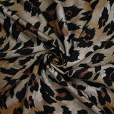Maille Milano polyviscose leopard fond taupe