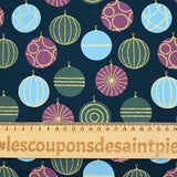 Popeline de coton imprimée boules festives et éclats dorés fond bleu marine