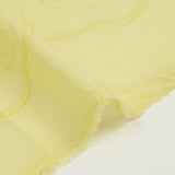 Pale yellow scalloped English embroidery