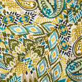 Double gaze matelassée double face ikat et cachemire vert et ocre au mètre