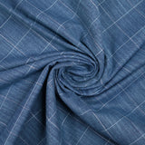 Woven cotton dyed white line check mottled blue background